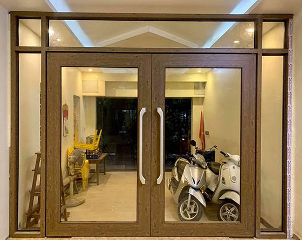 Cửa nhôm kính cường lực màu nâu sáng